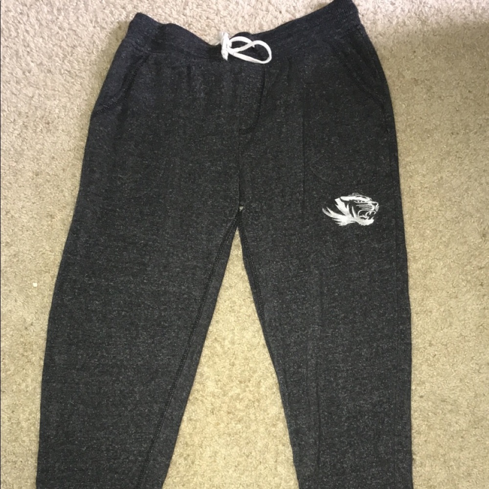 Grey joggers with tiger emblem